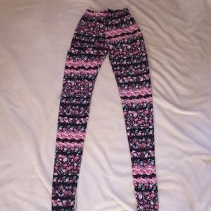 Soft “rue 21” leggings with floral pattern.